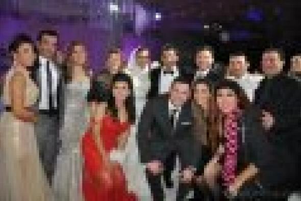 بالصور: نادية مصطفى وأركان فؤاد يحتفلان بزفاف ابنتهما