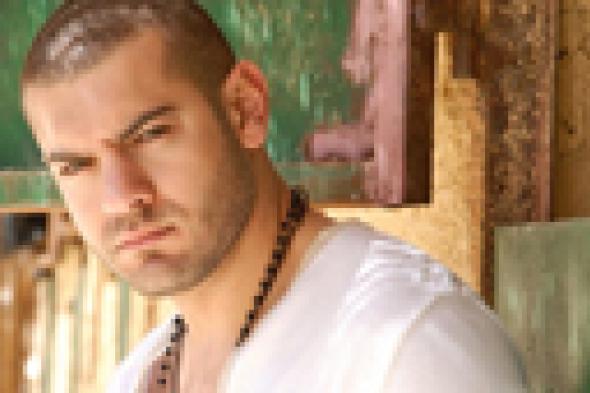 عمرو يوسف بين فيلم ومسلسل في 2014