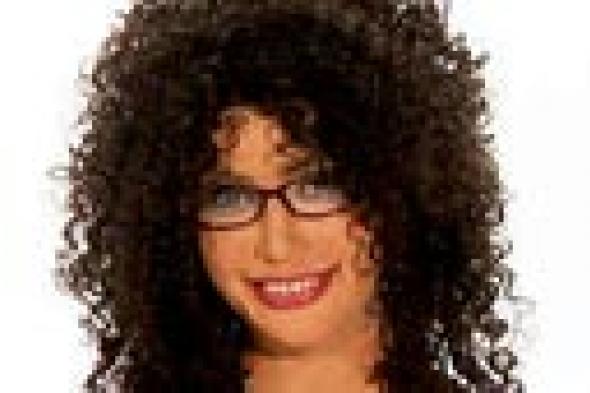 بالصور: كيف تنكرت كيم كاردشيان من أجل "Celebrities Undercover"؟