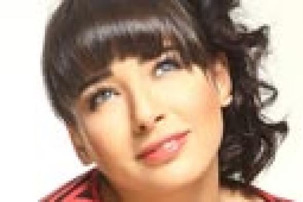 خاص: ساندي تصور "حياة طبيعية" و"حلوة جدا" بالولايات المتحدة الأمريكية