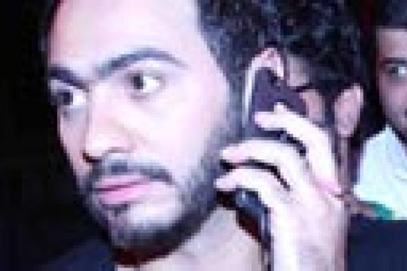 بالصور- تامر حسني يشرف على التحضيرات النهائية لحفل استاد القاهرة