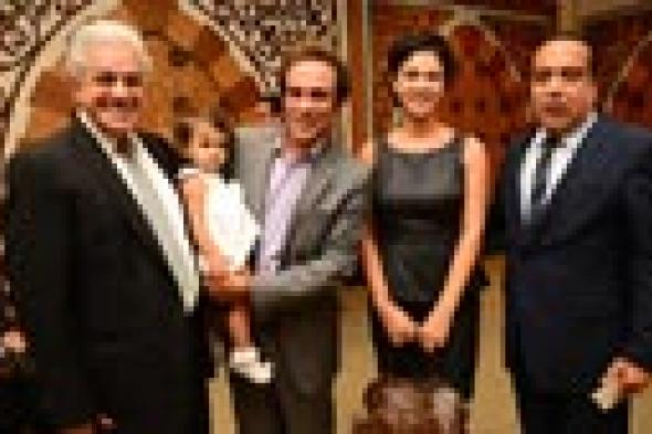 بالصور- الظهور الأول لابنة بسمة وعمرو حمزاوي