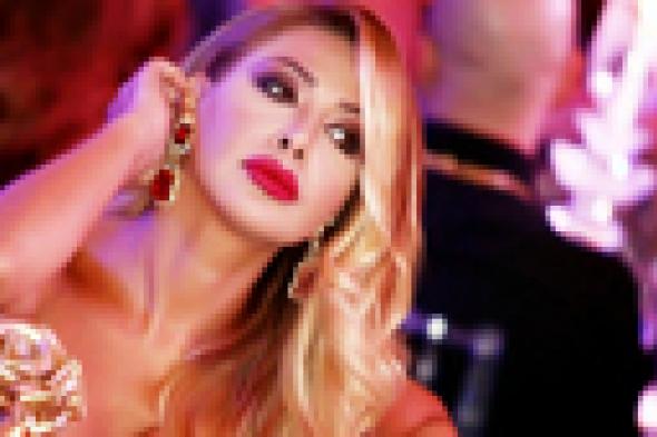 صورة- نوال الزغبي تحارب سرطان الثدي بشعرها