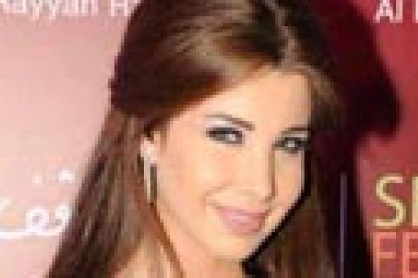 صورة- نانسي عجرم مع شقيقها في عشاء.. فهل يشبهها؟