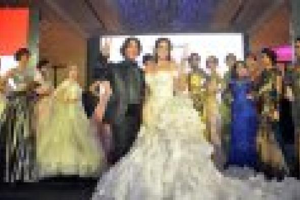 بالصور.. درة تتألق في فستان زفاف بتوقيع هاني البحيري