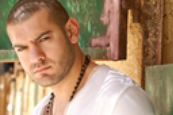 عمرو يوسف يدخل سباق رمضان 2015 بـ"ظرف أسود"