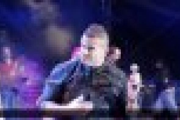 بالصور: عمرو دياب يشعل حفله في "Media City Amphitheatre" بدبي