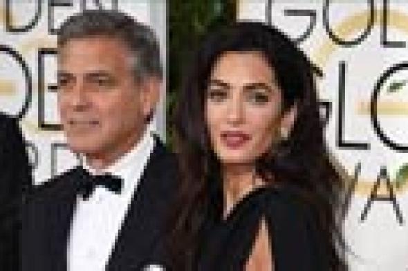 بالفيديو- جورج كلوني يُحرج زوجته في "جولدن جلوب" 2015 بتغزله فيها
