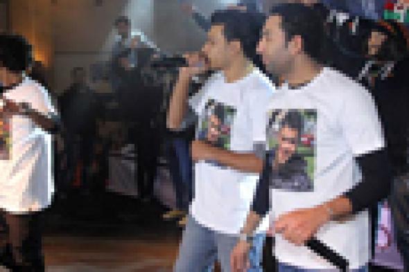 بالصور: أوكا ينعي "زؤلة" في أول ظهور له بعد زواجه من مي كساب
