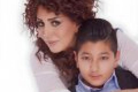 بالصور: وفاء عامر في جلسة تصوير مع ابنها بمناسبة عيد الأم