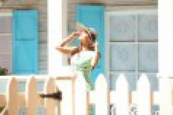 بالصور: ديانا حداد بإطلالة جديدة في كواليس كليب "الأرض غنت"