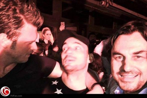 بالصور- التركي "مهند" يحتفل بفوز فريقه بالدوري التركي برفقة اللاعب ويسلي شنايدر