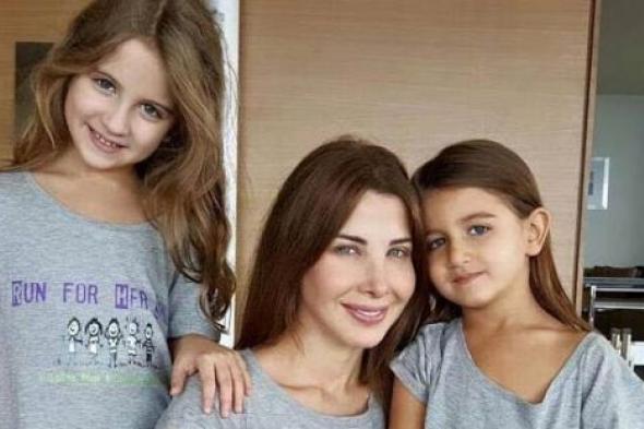 صورة- نانسي عجرم تدعم مركز لعلاج سرطان الأطفال بصورة مع ابنتيها