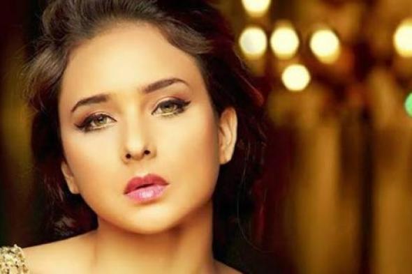 صورة- نيللي كريم في كواليس "سقوط حر" : مين قال إن المسلسل دموع.. ما احنا بنضحك اهو