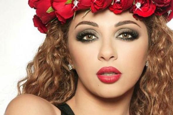 بالصور والفيديو- ميريام فارس بإطلالة كلاسيكية بفستان أحمر
