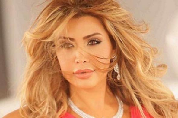بالصور- نوال الزغبي بالذهبي في أغنيتها المصورة الجديدة "تولع"