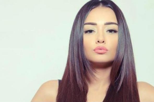 راندا البحيري تحاول تقليد عضلات أحمد التهامي