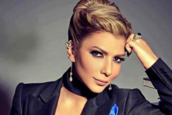 صورة - أصالة  مع زوجها وشقيقها بعد إخلاء سبيلها من تهمة حيازة المخدرات