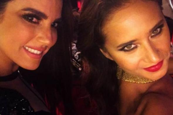 صورة- نيللي كريم مصورة فوتوغرافية ودرة الموديل